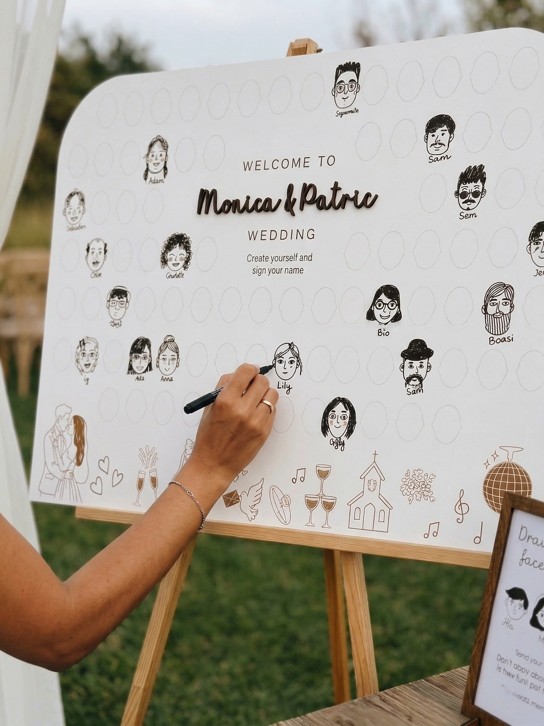 Unique wooden wedding guest book where guests draw portraits
