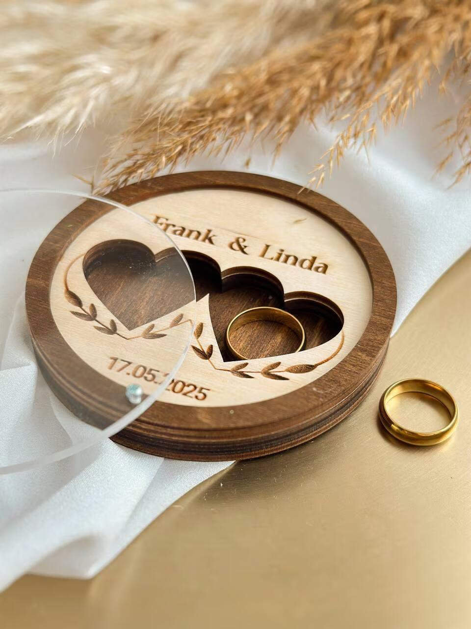 Handmade wooden ring box with heart cutout for wedding ceremony
