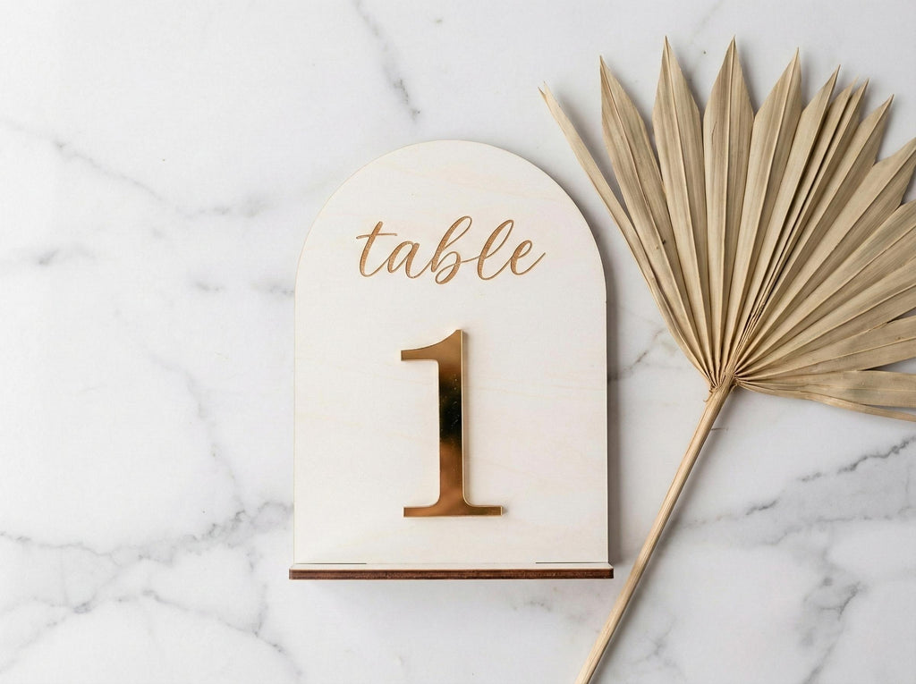 Custom arch wedding table numbers in white finish
