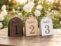 Arch wooden wedding table numbers with jute twine bow
