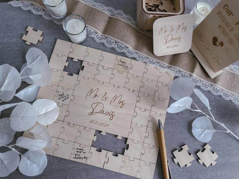 Wedding puzzle guest book pieces showing guest signatures
